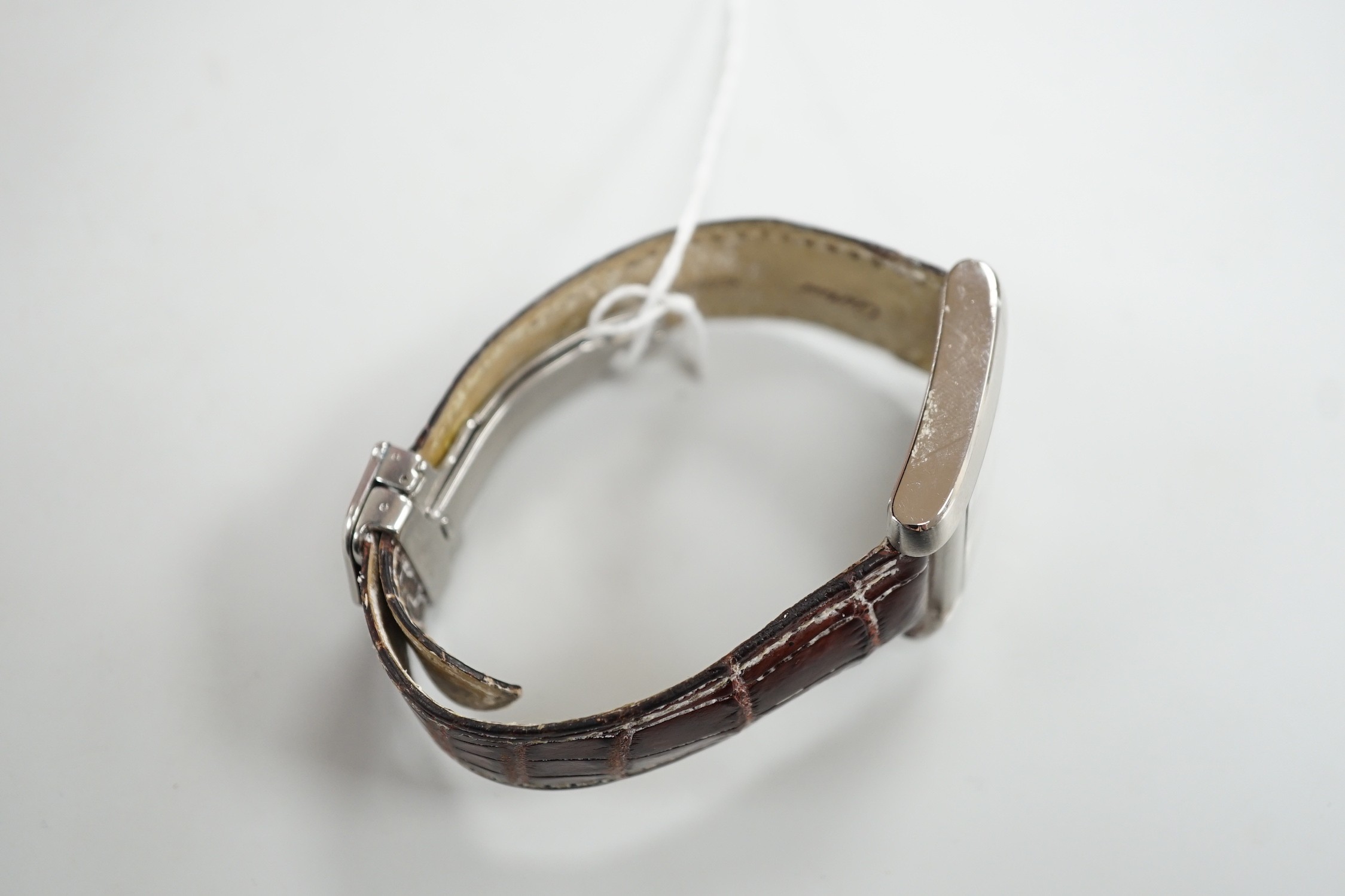 A gentleman's 2006 stainless steel Cartier Tank Francaise quartz wrist watch, with Roman numerals and two subsidiary dials, case diameter 30mm, with original Cartier box and booklets.